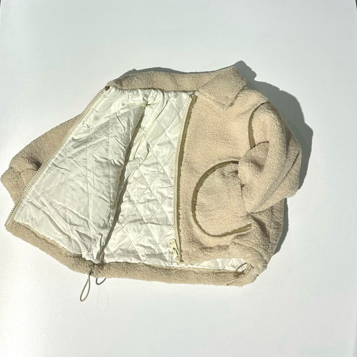 Giubbotto teddy beige